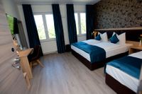 Ihr modern eingerichtetes Zimmer in N&uuml;rnberg - Hotel LACIN